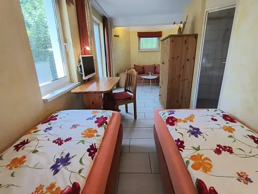 Schlafbereich mit Einzel- oder Doppelbett